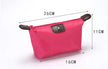 Waterproof Nylon Cosmetic Bag For Women, Cute Dumpling Shape, Zipper Makeup Travel Pouch shown in a compact solid-color design
