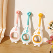 Baby Toothbrush For Infants And Toddlers 0-3, Small Head, Cartoon Handle, Suction Cup Base standing upright on its suction cup storage base
