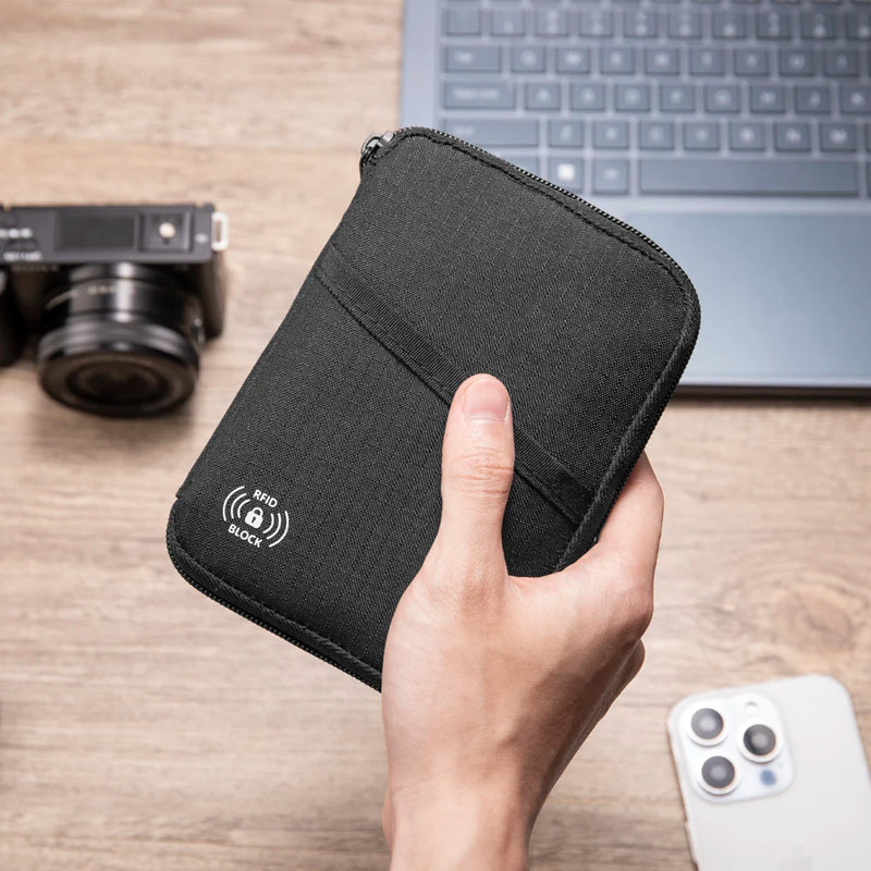 RFID Blocking Passport Holder Travel Wallet, Nylon Document Organizer For Men And Women displaying its slim nylon construction and travel storage