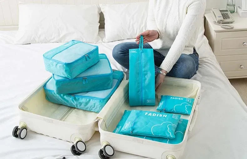7-Piece Travel Packing Cubes Set, Waterproof PVC Luggage Organizer Bags For Clothes And Shoes folded for compact suitcase storage