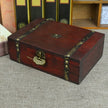 Vintage Wooden Storage Box With Bronze Details, Jewelry Organizer, Keepsake Chest 23x16x7.5cm displaying its decorative bronze fasteners and rustic rectangular design