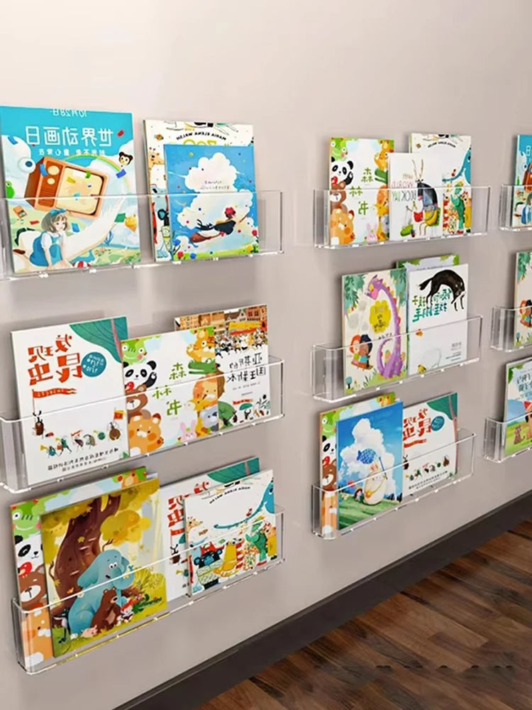 Wall-Mounted Transparent PET Book Display Rack, No-Drill Magazine Organizer For A4 Sheets shown as a clear wall-mounted holder for books, magazines, and documents