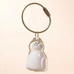 Pet Hair Memorial Keychain, Cat-Shaped Resin Storage Capsule For Cat And Dog Fur Keepsake shown as a cute cat-shaped resin pet memorial charm with key ring
