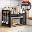 Expandable Microwave Shelf Organizer, 42-64cm Adjustable Rust-Resistant Countertop Rack shown as a black kitchen storage shelf