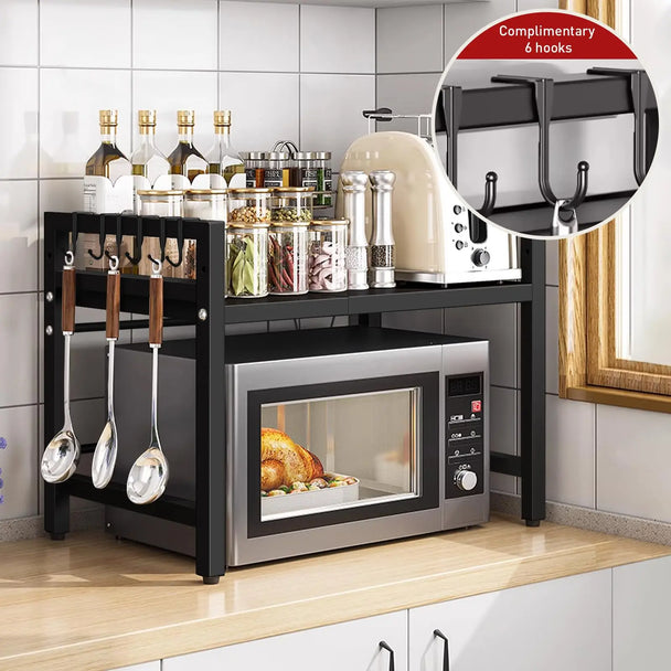 Expandable Microwave Shelf Organizer, 42-64cm Adjustable Rust-Resistant Countertop Rack shown as a black kitchen storage shelf