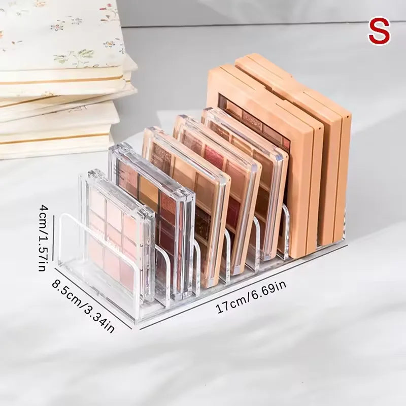 7-Compartment Makeup Organizer, Clear Eyeshadow Palette Storage Rack For Desktop Or Drawer displaying eyeshadow palettes neatly arranged for vanity or drawer storage