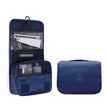 Waterproof Hanging Travel Makeup Bag, Foldable Toiletry Organizer With Hook hanging from a bathroom hook for easy access