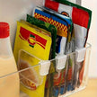 4/8Pcs Adjustable Refrigerator Storage Dividers, Plastic Fridge Separators For Bottles And Cans used to organize drinks and packaged foods in a refrigerator