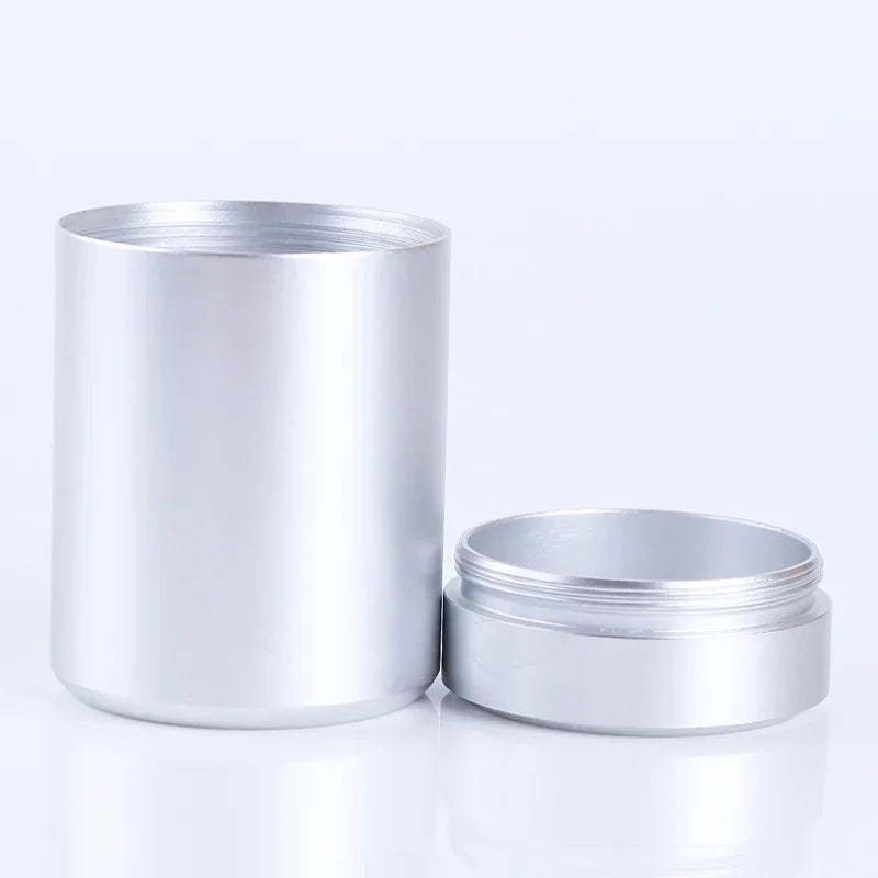 Mini Stainless Steel Airtight Storage Tin, Portable Travel Jar For Nuts Candy Tea, 4.5cm x 7cm shown with its compact polished metal design