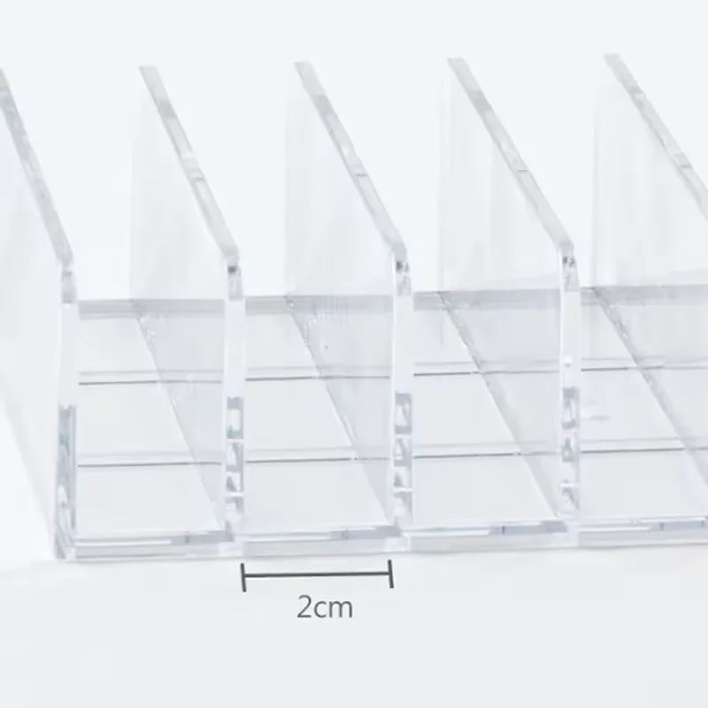 7-Compartment Makeup Organizer, Clear Eyeshadow Palette Storage Rack For Desktop Or Drawer shown holding multiple makeup palettes