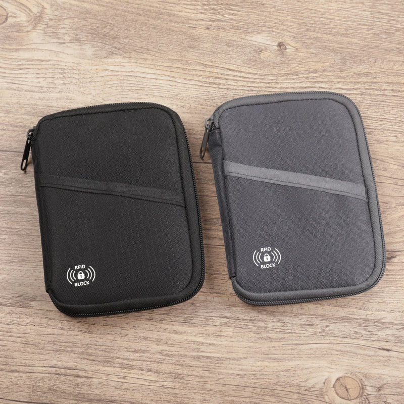 RFID Blocking Passport Holder Travel Wallet, Nylon Document Organizer For Men And Women shown as a compact travel document wallet