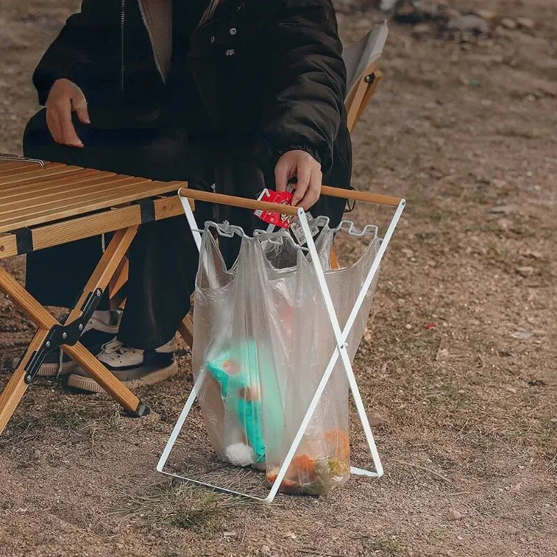 MOUNTAINHIKER Folding Iron Garbage Bag Rack With Wooden Handle, Portable Kitchen Organizer shown in a compact folding design