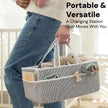 Baby Diaper Caddy Organizer, Organic Cotton Storage Basket For Newborn Essentials shown holding diapers, wipes, and changing supplies