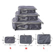 Foldable Compression Packing Cubes, Waterproof Oxford Travel Bags With Handles, Luggage Organizer shown as a compact travel storage bag for clothing and suitcase packing
