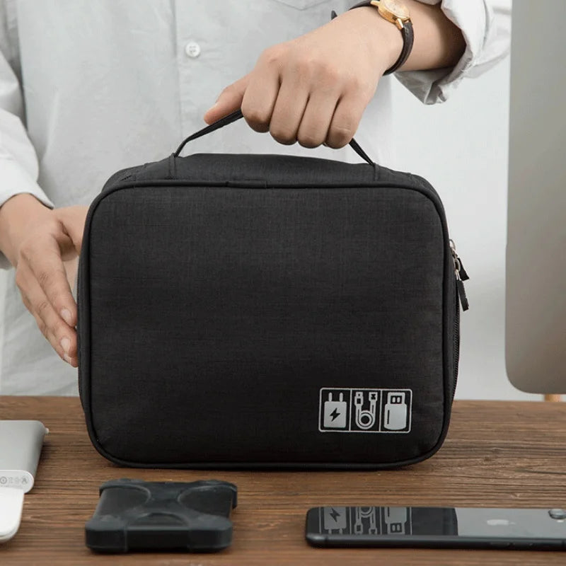 Travel Electronics Organizer Bag, Multi-Layer Oxford Cable, Charger And Tech Accessory Case shown with organized cables and chargers