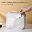 Waterproof Hanging Travel Makeup Bag, Foldable Toiletry Organizer With Hook holding cosmetics and travel toiletries